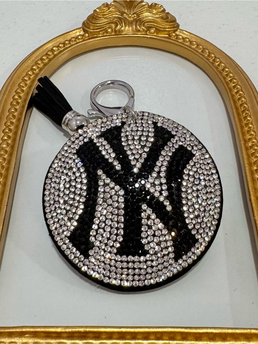 New Crystal Round NY Keychain with Black Tassel